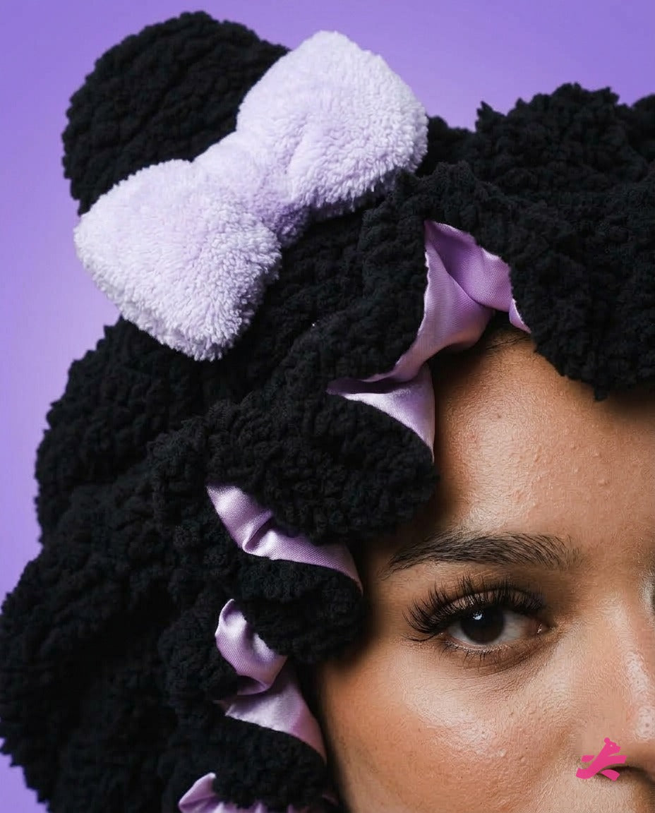 Close up of the lilac plush bow and satin lining